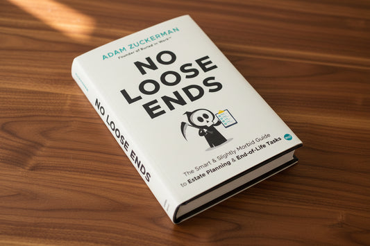 Book titled 'No Loose Ends' on a wooden surface