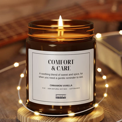 Comfort & Care candle lit, with string lights