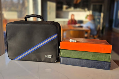 The CLEAR Kit is on a counter in front of two women in the background.