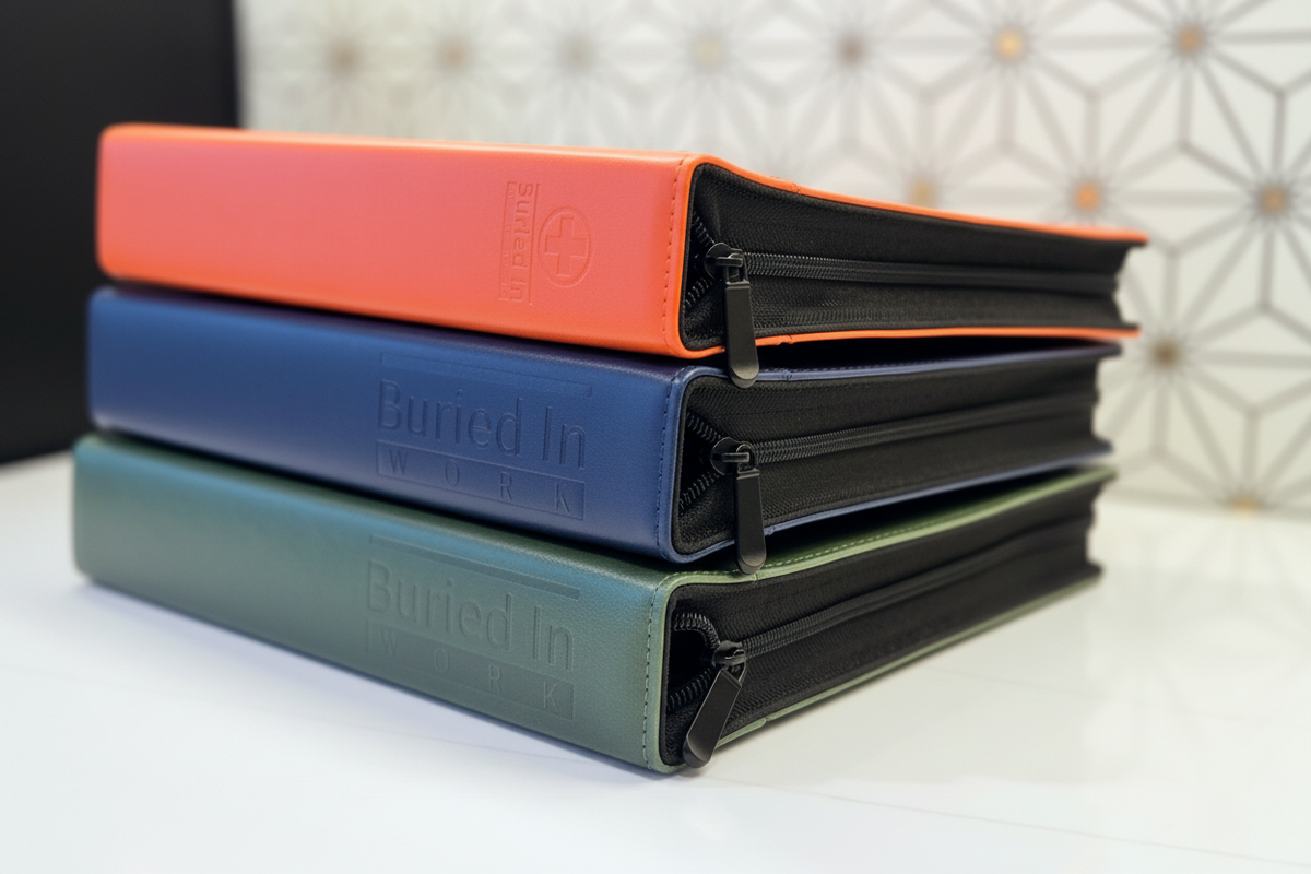 The three CLEAR Kit Expanded binders