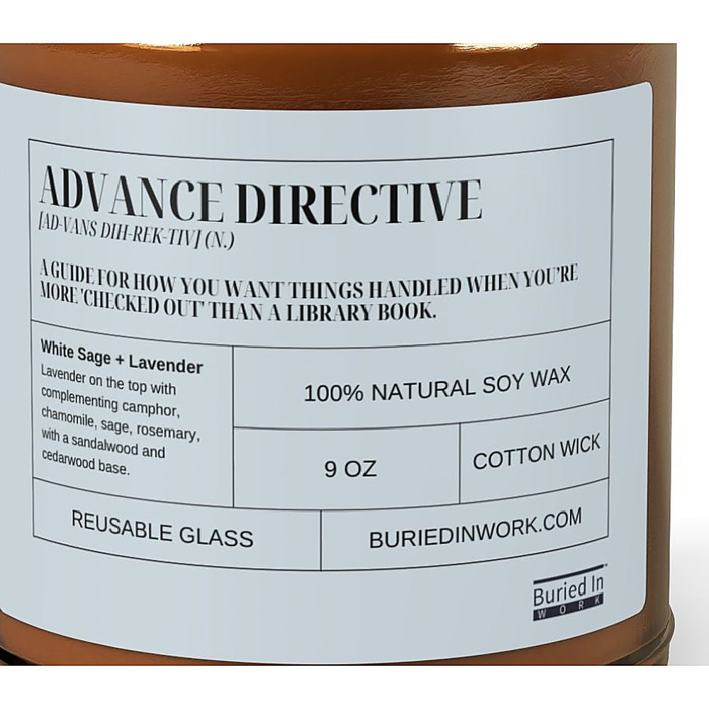 Close-up of the Advance Directive candle label: a guide for how you want things handled when you're more checked out than a library book. White Sage and Lavender, 100% natural soy wax, cotton wick, reusable glass