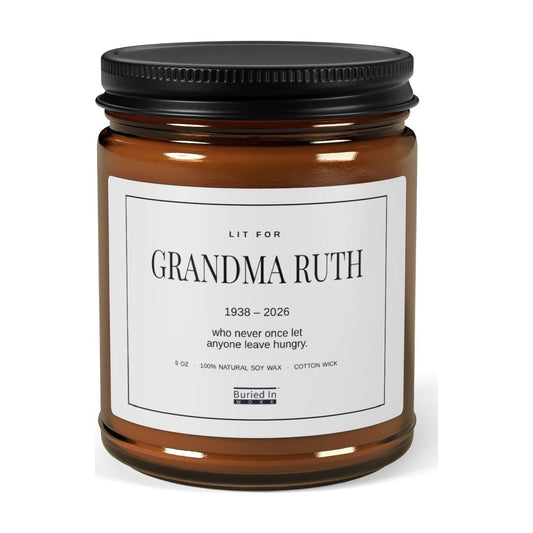 Lit For personalized memorial candle in an amber glass jar