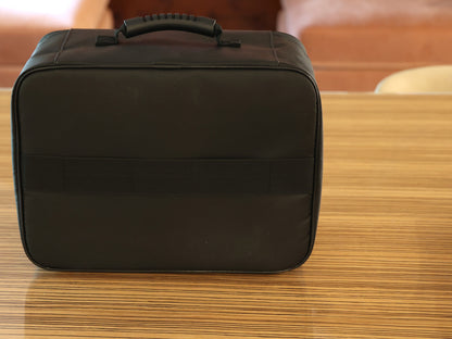 Back of the large storage case showing the luggage pass-through strap