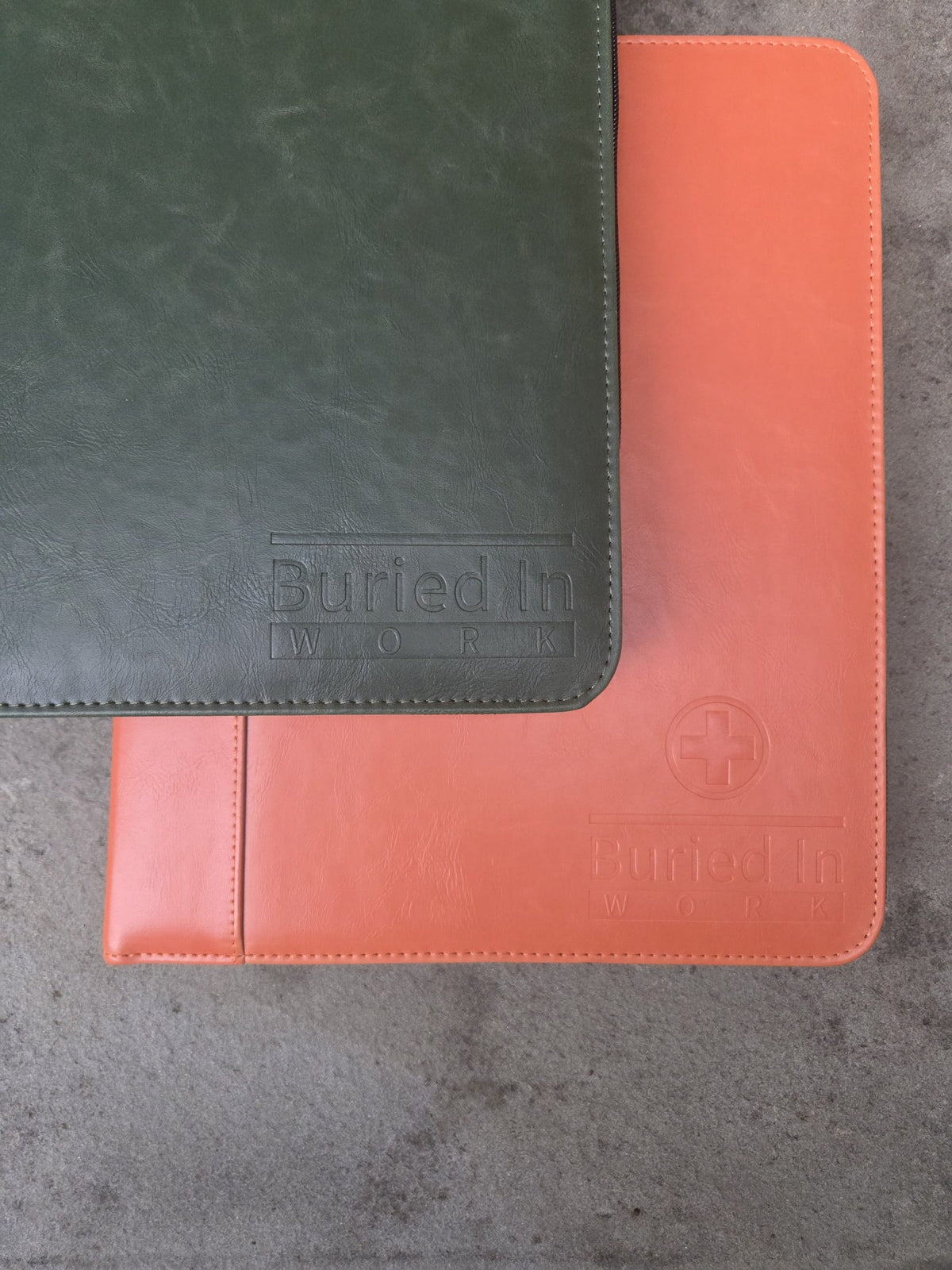 Orange Core Essentials and green Expanded CLEAR Kit binders