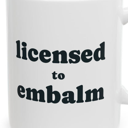 Close-up of the Licensed to Embalm Mug design