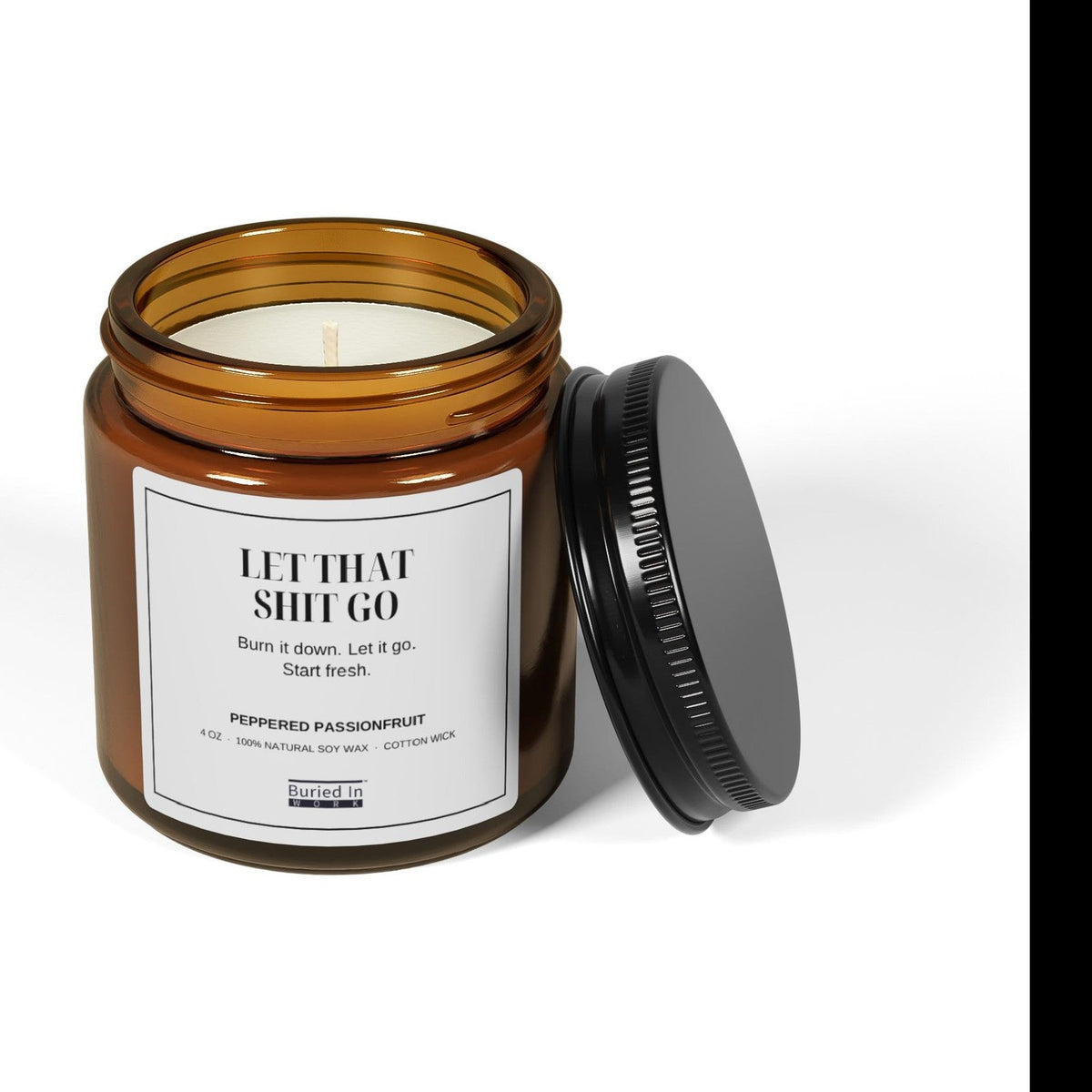 Let That Shit Go candle with the lid off
