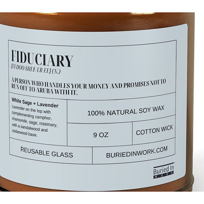 Close-up of the Fiduciary candle label: a person who handles your money and promises not to run off to Aruba with it. White Sage and Lavender, 100% natural soy wax, cotton wick, reusable glass
