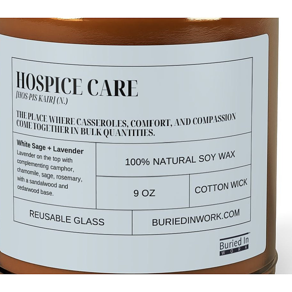 Close-up of the Hospice Care candle label: the place where casseroles, comfort, and compassion come together in bulk quantities. White Sage and Lavender, 100% natural soy wax, 9 oz, cotton wick, reusable glass