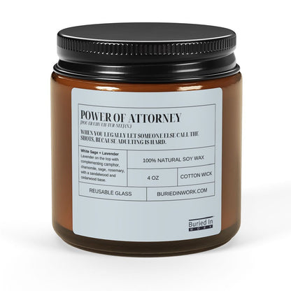 Power of Attorney soy candle, 4 oz amber jar with black lid, front view