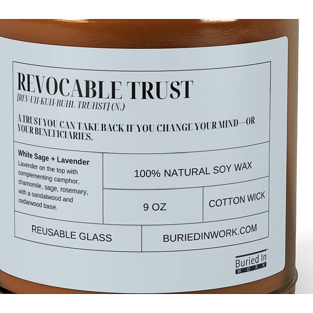 Close-up of the Revocable Trust candle label: a trust you can take back if you change your mind, or your beneficiaries. White Sage and Lavender, 100% natural soy wax, cotton wick, reusable glass